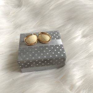 Gold and cream earrings
